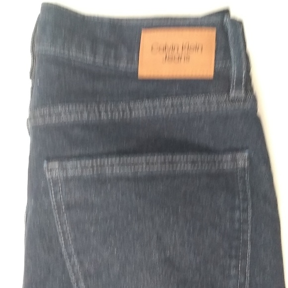 Women's size 28 Calvin Klein jeans. Like new. Nice tight fitting jeans. Hot Mom - Picture 2 of 8